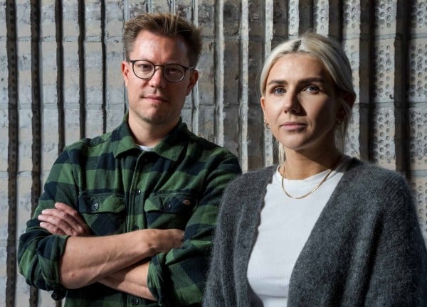The photo shows researchers involved in the project, a man and a woman.